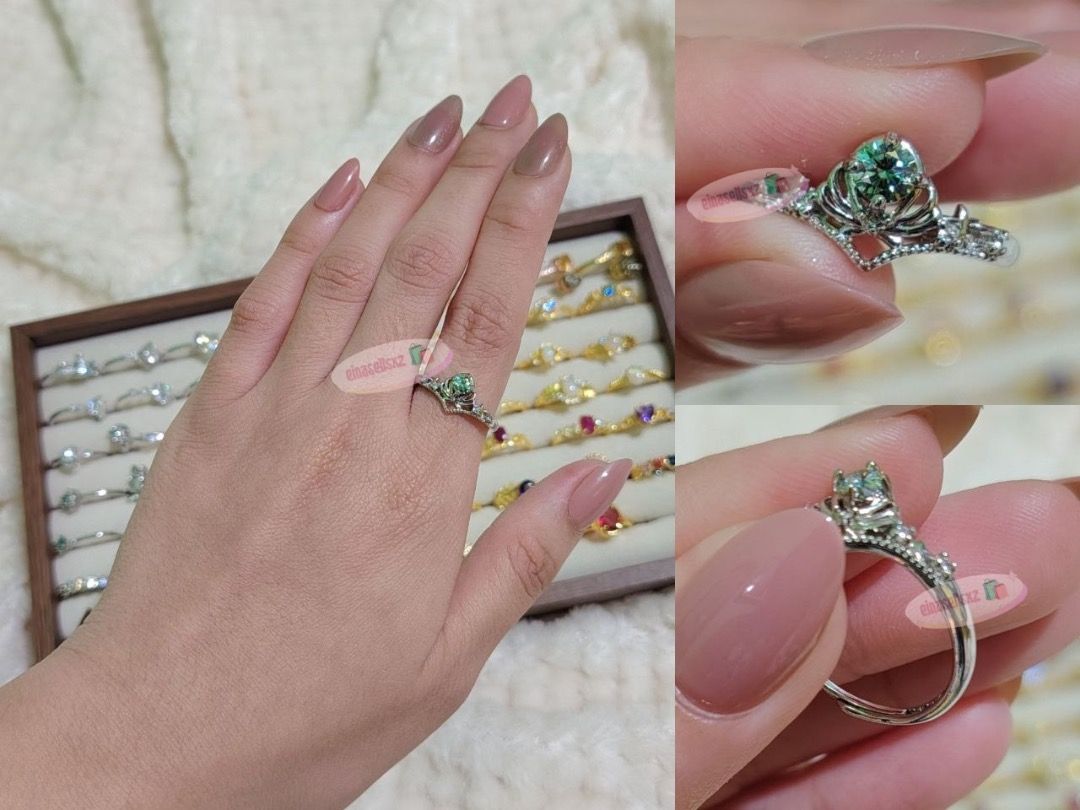 Silver Mint Moissanite Royal Tiara Crown Ring (Adjustable Band) (Category: Rings) located in Basista. Submitted by einasellsxz (Listing ID 1470042339, Image 1). Description: ☑ can pass moissanite tester - pictures upon request ✨ Vintage Princess Tiara Mint Green Moissanite Crown Ring ✨ Step into a fairytale with this exceptionally regal and whimsical statement piece. This ring features a brilliant mint green round-cut moissanite stone nestled ins