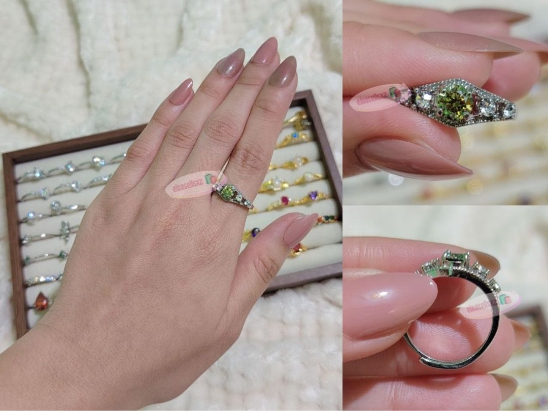 Silver Olive Green Moissanite Art Deco Shield Ring (Adjustable Band) (Category: Rings) located in Basista. Submitted by einasellsxz (Listing ID 1470035624, Image 1). Description: ☑ can pass moissanite tester - pictures upon request ✨ Art Deco Vintage Shield Olive Green Moissanite Ring ✨ Looking for a stunning statement piece or a unique gift? This gorgeous vintage-inspired cocktail ring features an eye-catching olive green round-cut moissanite st