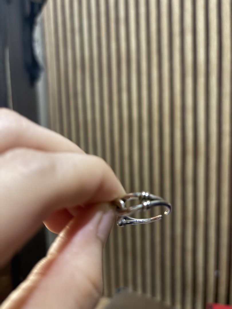 Silver Open Ring with Knot Detail (Category: Rings) located in Caloocan City. Submitted by berndale_closet (Listing ID 1470026387, Image 3). Description: - Material/Color: Silver, with 925 markings but not tested - Design: Unique center knot with an industrial vibe - Fit: Adjustable open band, easy to slip on and off - Style: Versatile everyday accessory Japan Sourced.