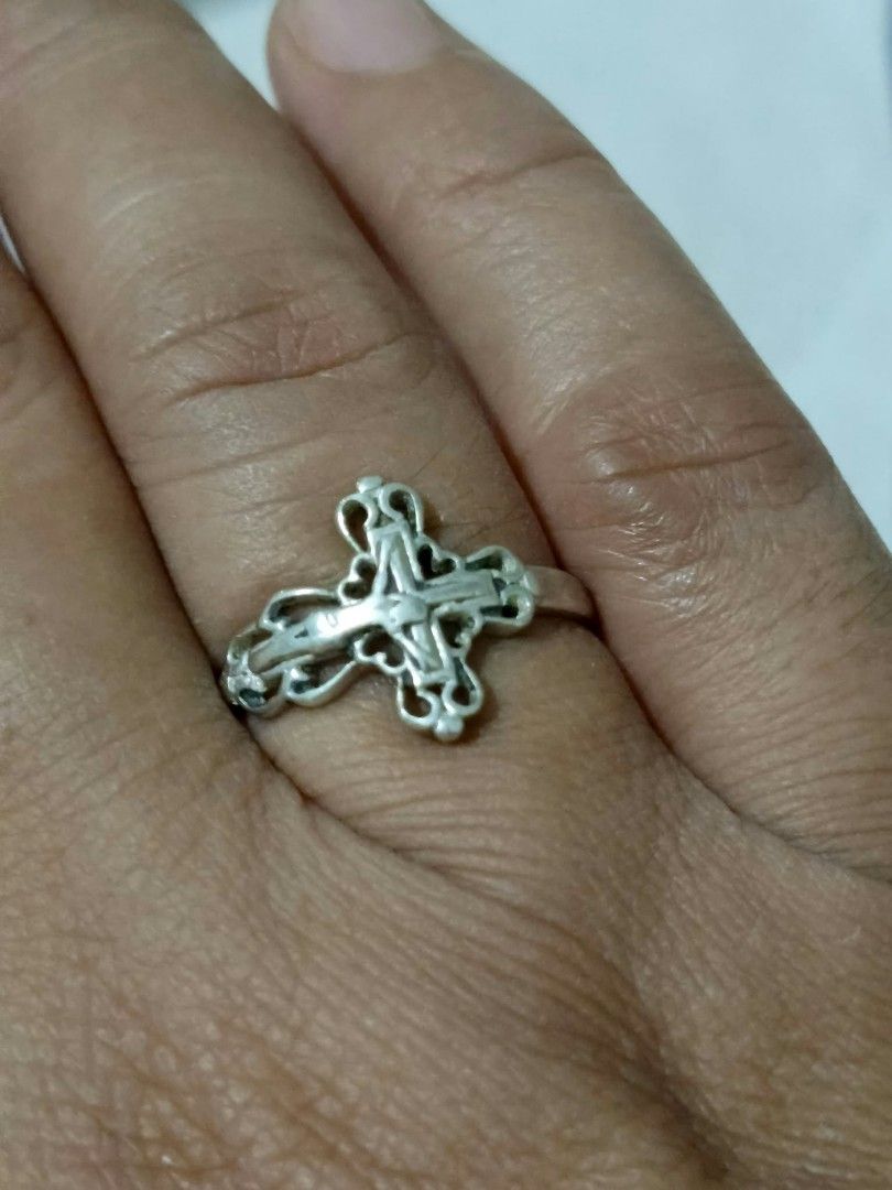 Silver Ornate Cross Ring Size 17 (Category: Rings) located in Abucay. Submitted by thrifty.picked (Listing ID 1470120935, Image 2). Description: - Material/Color: Silver ring - Design: Intricate cross with delicate filigree details along the band and edges - Size: Approximately size 17 on the mandrel - Fit: Slim band style, lightweight, and comfortable for any finger - Condition: Brand new / Excellent (ready to ship).