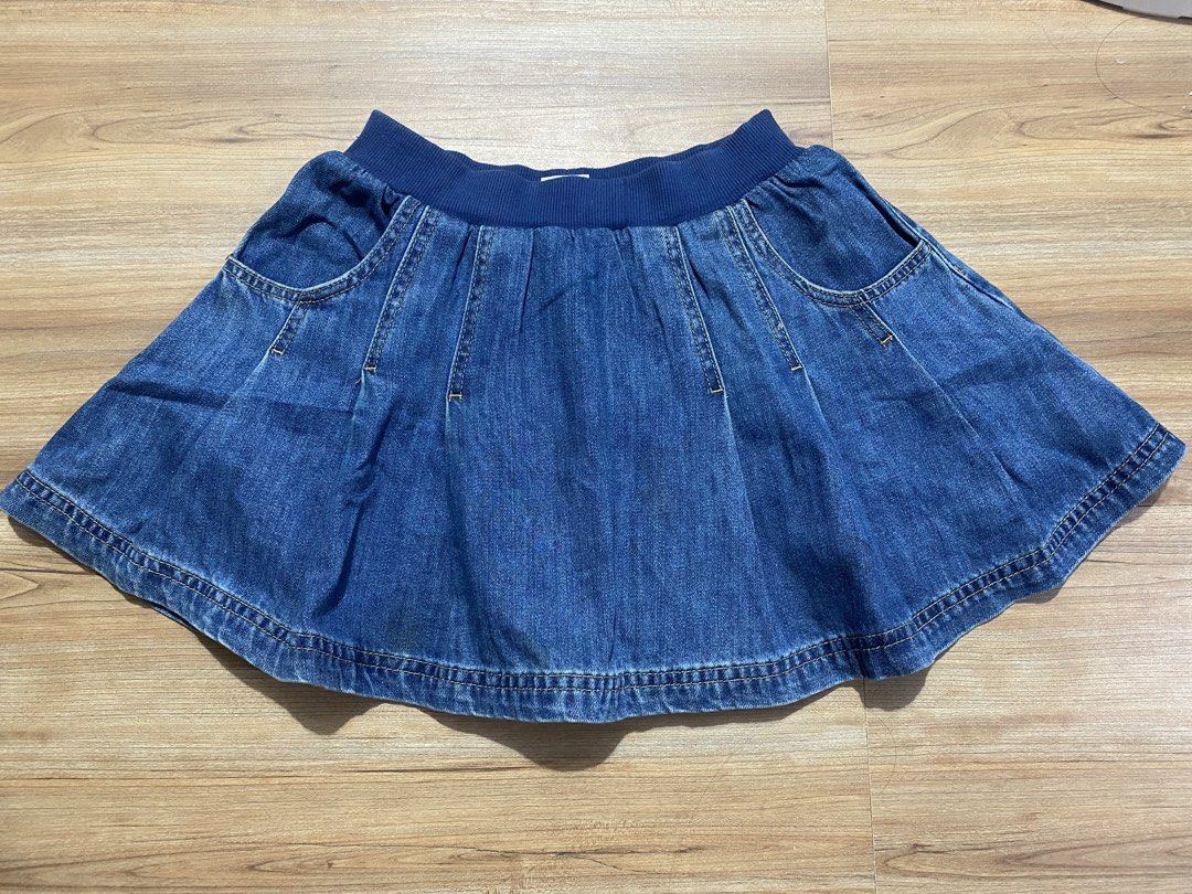 skirt 24"-30" (Category: Skirts) located in Bulacan. Submitted by Spothings (Listing ID 1470028427, Image 1). Description: Garterized denim With two pockets Length 13" - Style: Flared denim skirt with structured pleats - Waistband: Dark blue elastic ribbed waistband for a stretchable, pull-on fit - Pockets: Two front pockets accented with contrast yellow stitching - Hem: Flare hemline with neat double stitch lines - Perfect for: Casual everyday o