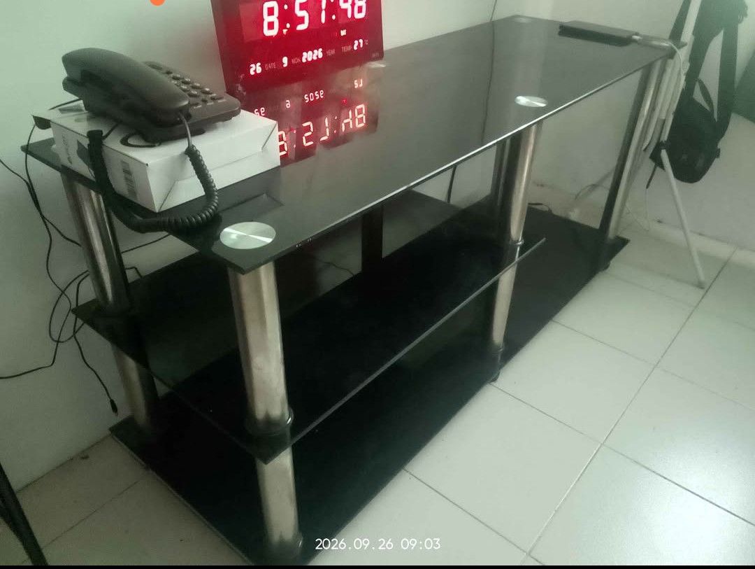 Sleek Modern Black Tempered Glass TV Stand / Console Table (Category: Tables & Sets) located in Valenzuela. Submitted by justgorjas (Listing ID 1470042405, Image 1). Description: Size: 130x45x60 CONSOLE TABLE / TV STAND NO issues Super intact pa. Bought it for 6k, selling it as 950 nalang po. Moving out na. LOCATION: brgy pantoc, Meycauayan.