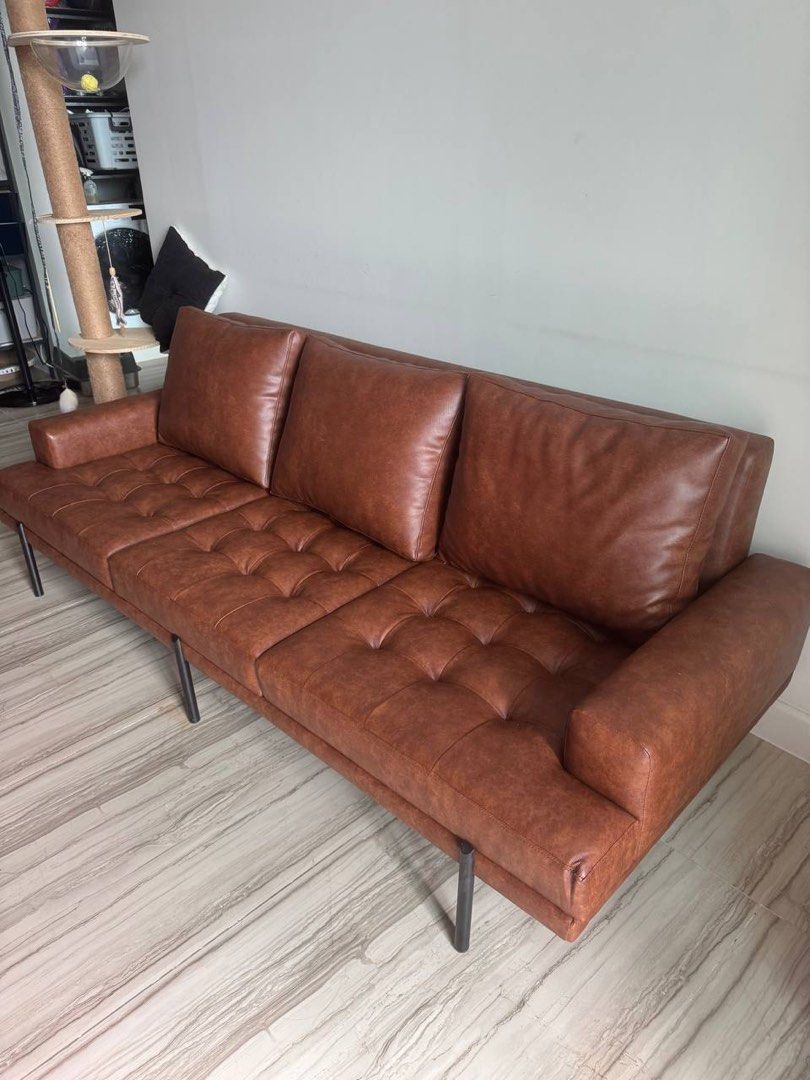 Soft leather sofa (Category: Sofas) located in Quezon City. Submitted by maira.andrea (Listing ID 1470138524, Image 1). Description: Bought for 34k, selling for 29k (price negotiable) Dimensions: Length - 200cm Height - 80cm Depth - 80cm.