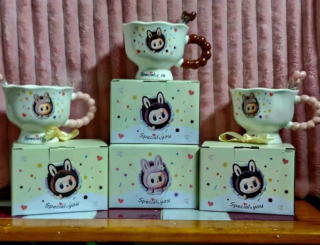 Special You Labubu Ceramic Mug with Spoon and Box (Category: Coffee & Tea Tableware) located in Caloocan City. Submitted by noblewind_c67e6d (Listing ID 1470095392, Image 2). Description: - Adorable ceramic mug with a cute bunny character graphic - Unique multicolored design with a comfortable bubble handle - Includes a matching spoon for your coffee, tea, or hot chocolate - Comes in an original 'Special you' gift box - Box packaging is fully int