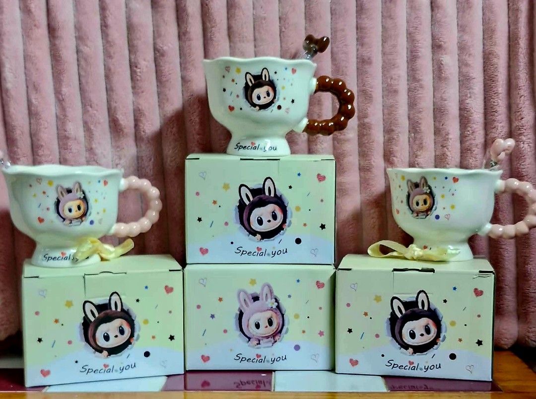 Special You Labubu Ceramic Mug with Spoon and Box (Category: Coffee & Tea Tableware) located in Caloocan City. Submitted by noblewind_c67e6d (Listing ID 1470095392, Image 3). Description: - Adorable ceramic mug with a cute bunny character graphic - Unique multicolored design with a comfortable bubble handle - Includes a matching spoon for your coffee, tea, or hot chocolate - Comes in an original 'Special you' gift box - Box packaging is fully int