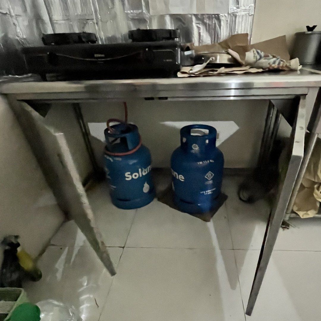 Stainless Steel Kitchen Table (Category: Tables & Sets) located in Quezon City. Submitted by annmalabanan (Listing ID 1470015138, Image 2). Description: Stainless Steel Table Best for Gas Stove with holes for LPG hose 60 x 135 x 80 cm Location: Palmera Homes, Novaliches, QC.