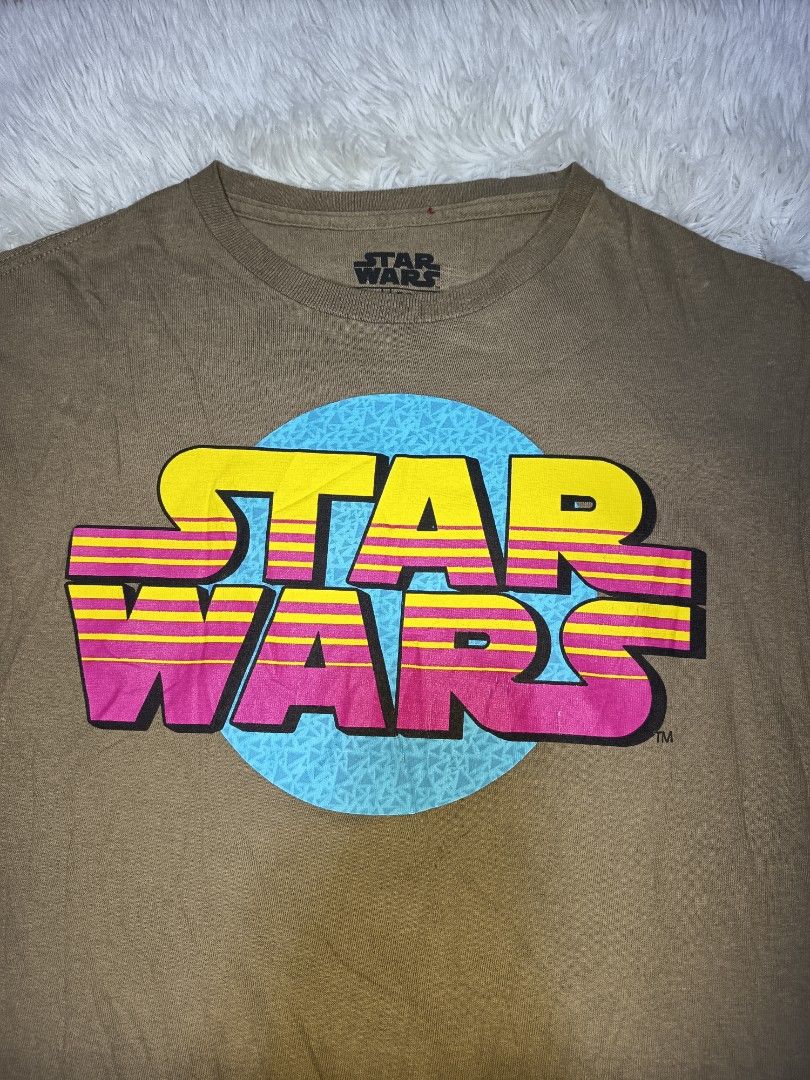 Star Wars Tshirt (Category: Tshirts & Polo Shirts ) located in Pasay City. Submitted by ODDXX (Listing ID 1470109140, Image 2). Description: Star Wars Tshirt Khaki Medium On Tag Actual Dimes: 19" x 25" No issue. Need Wash Only! 265 Pesos (Free Shipping).