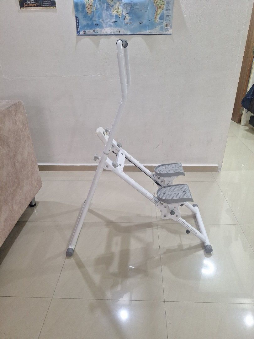 Stepper (Category: Cardio & Fitness Machines) located in Singapore. Submitted by moonwalker2619 (Listing ID 1470018018, Image 4). Description: - Type: Home exercise stepper with handlebars - Color: White with grey pedals - Features: Built-in LCD fitness tracker to monitor workout stats - Design: Sturdy metal frame, textured non-slip foot pedals for safety - Condition: Well-maintained and fully functional - Collection: Meetup at Bedok Reservoir Ro