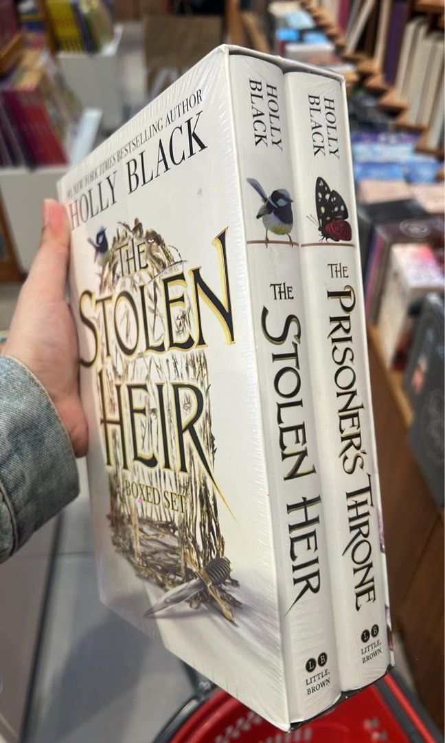 Stolen Heir Boxed Set by Holly Black (Category: Storybooks) located in Pasig City. Submitted by amaribloomco_ (Listing ID 1470056235, Image 2). Description: The Stolen Heir is a fantasy duology written by Holly Black, set in the same world of Faerie as her bestselling The Folk of the Air trilogy. Books in the Duo logy • Book 1: The Stolen Heir • Book 2: The Prisoner’s Throne.