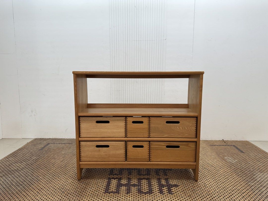 Storage cabinet (Category: Shelves, Cabinets & Racks) located in Quezon City. Submitted by matetdevis13 (Listing ID 1470110323, Image 1). Description: Modern Solid Wood 6-Drawer Storage Cabinet with Open Shelf Price: 6,900 L42.5 x W14 x H37.5 In good condition Code MJS40-R39.
