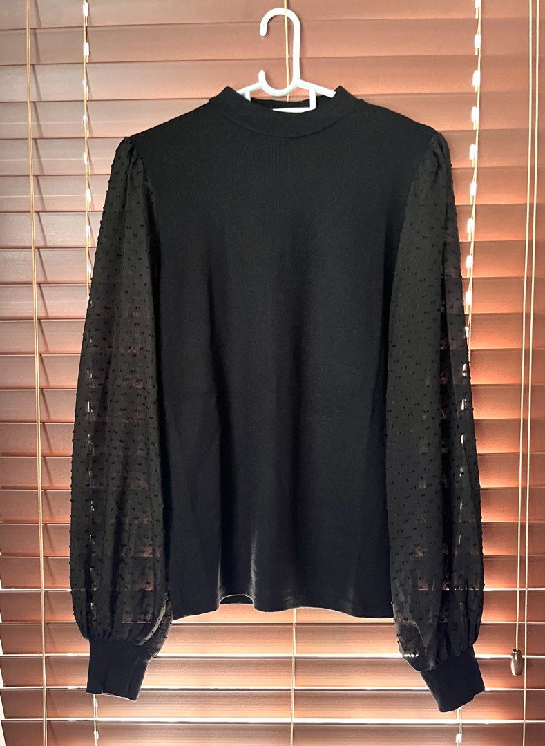 Stradivarius Black Long Sleeve Top Size M (Category: Longsleeves) located in Paranaque City. Submitted by tingar08 (Listing ID 1470103808, Image 1). Description: - Brand: Stradivarius - Size: M - Color: Black - Design: Mock neckline with solid knit body - Sleeves: Sheer puff sleeves with dotted texture and ribbed cuffs - Fit & Feel: Soft fabric, comfy fit - Versatility: Great for parties or smart casual night out.