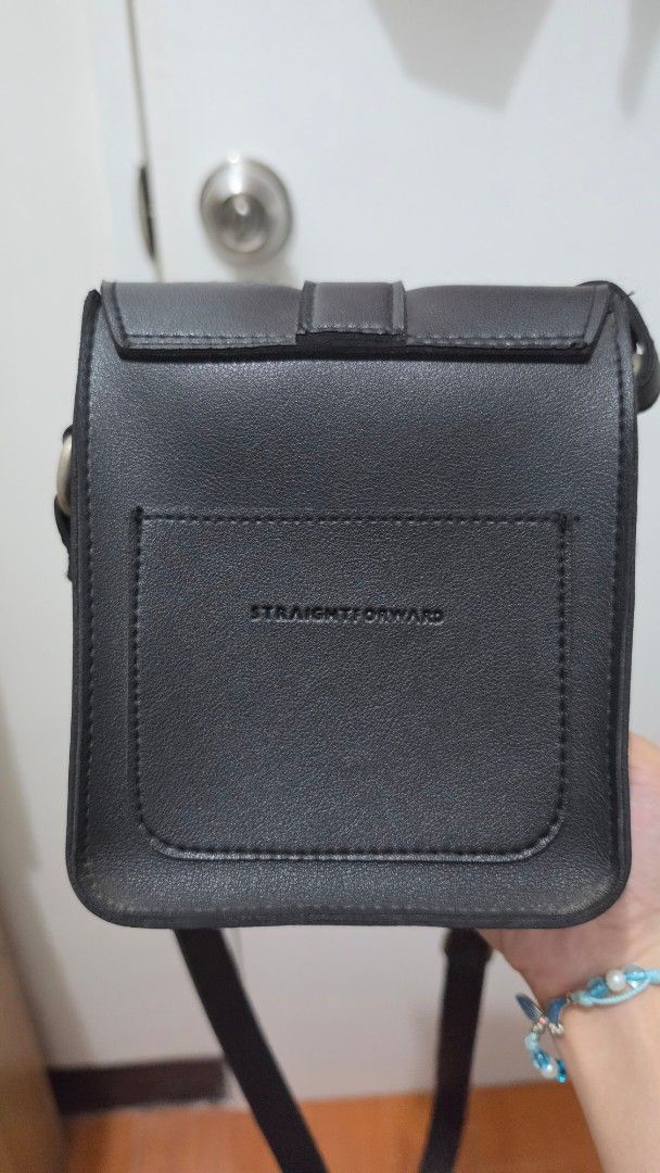 Straightforward Black Slip Sling Bag (Category: Cross-body Bags) located in Manila. Submitted by tori_mama21 (Listing ID 1470095401, Image 2). Description: Issue: Stained steel as seen in pics.