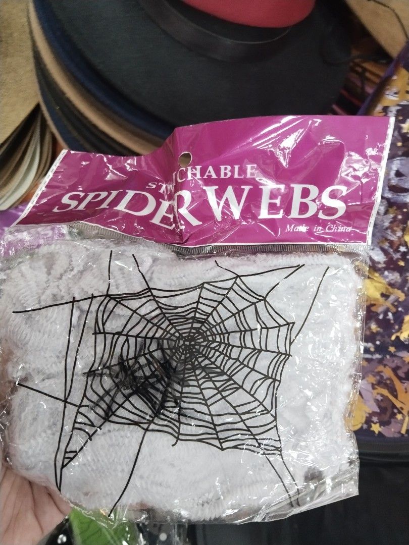 Stretchable Spider Webs Halloween Party Decoration (Category: Occasions & Party Supplies) located in Manila. Submitted by neojamesca55018 (Listing ID 1470003565, Image 1). Description: - Brand new, unopened package of stretchable Halloween spider webs - Comes in a convenient purple header bag - Quick and easy to pull apart and spread over furniture, doorways, or walls - Perfect for spooky party setups and DIY haunted houses - Made in China.
