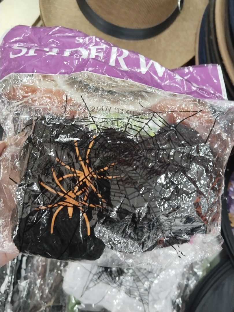Stretchable Spider Webs Halloween Party Decoration (Category: Occasions & Party Supplies) located in Manila. Submitted by neojamesca55018 (Listing ID 1470003565, Image 3). Description: - Brand new, unopened package of stretchable Halloween spider webs - Comes in a convenient purple header bag - Quick and easy to pull apart and spread over furniture, doorways, or walls - Perfect for spooky party setups and DIY haunted houses - Made in China.