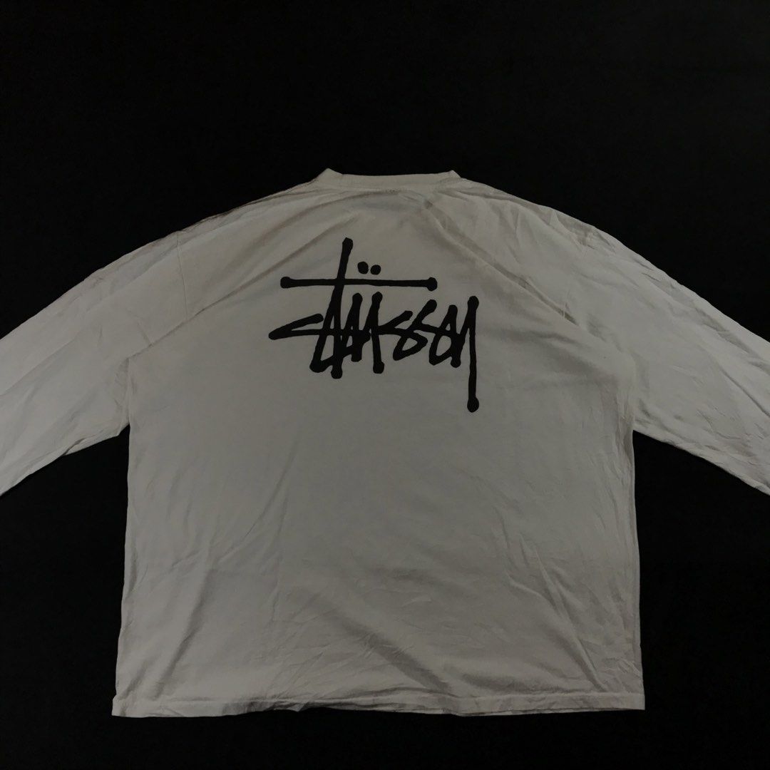 Stüssy Basic Logo Long-Sleeve T- Shirt (Category: Coats, Jackets and Outerwear) located in Manila. Submitted by a_aron.f6e3a7 (Listing ID 1470115483, Image 3). Description: Size: XXL Color rate: 8/10 (Off-white / Cream with Black Logo) Condition: Good pre-owned condition Issues: ripped sleeve not really noticeable.