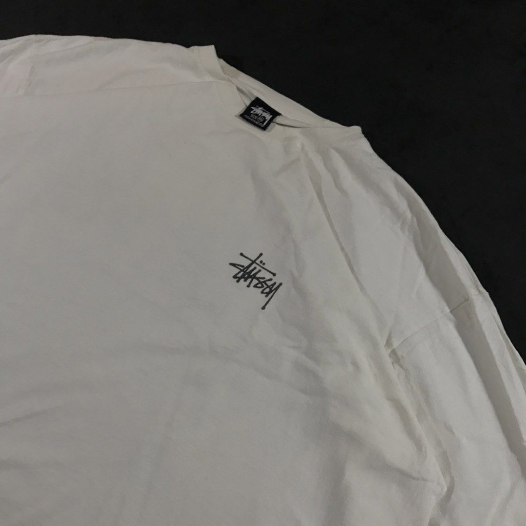 Stüssy Basic Logo Long-Sleeve T- Shirt (Category: Coats, Jackets and Outerwear) located in Manila. Submitted by a_aron.f6e3a7 (Listing ID 1470115483, Image 2). Description: Size: XXL Color rate: 8/10 (Off-white / Cream with Black Logo) Condition: Good pre-owned condition Issues: ripped sleeve not really noticeable.