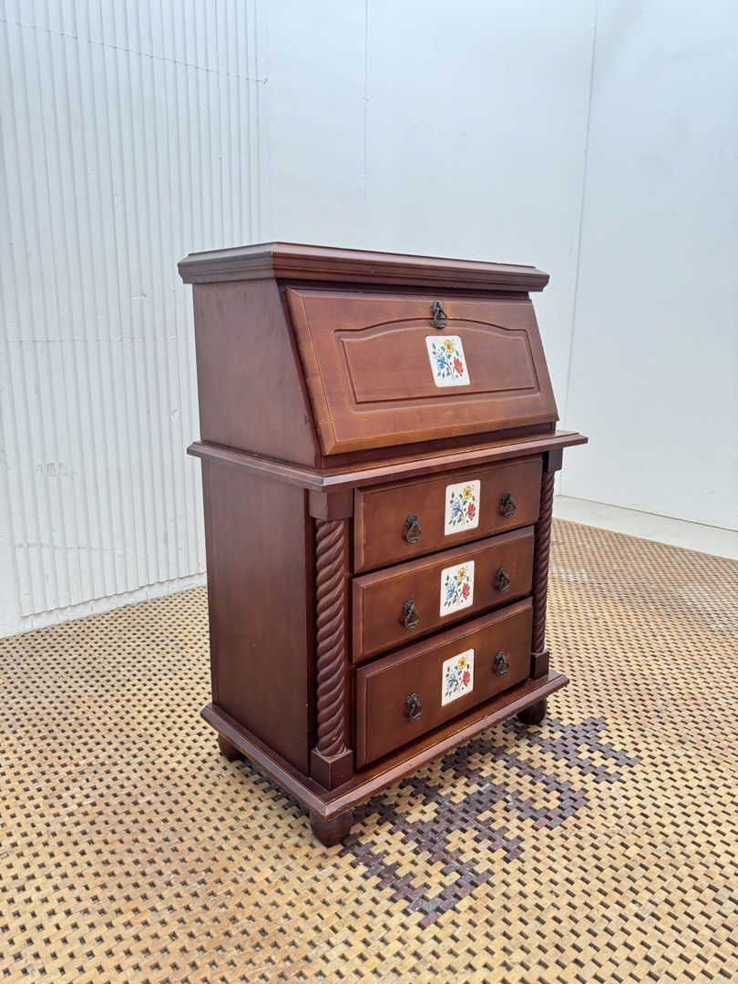 Study desk (Category: Tables & Sets) located in Quezon City. Submitted by matetdevis13 (Listing ID 1470122218, Image 2). Description: Vintage Wooden Secretary Desk with Drop-Front Writing Surface & 3 Drawers Price: 5,500 L24 x W21/14 x H34/23.5 In good condition Code MJS20-R12 The upper front folds down to create a writing/work surface, with storage space inside. The three lower drawers provide additional storage..