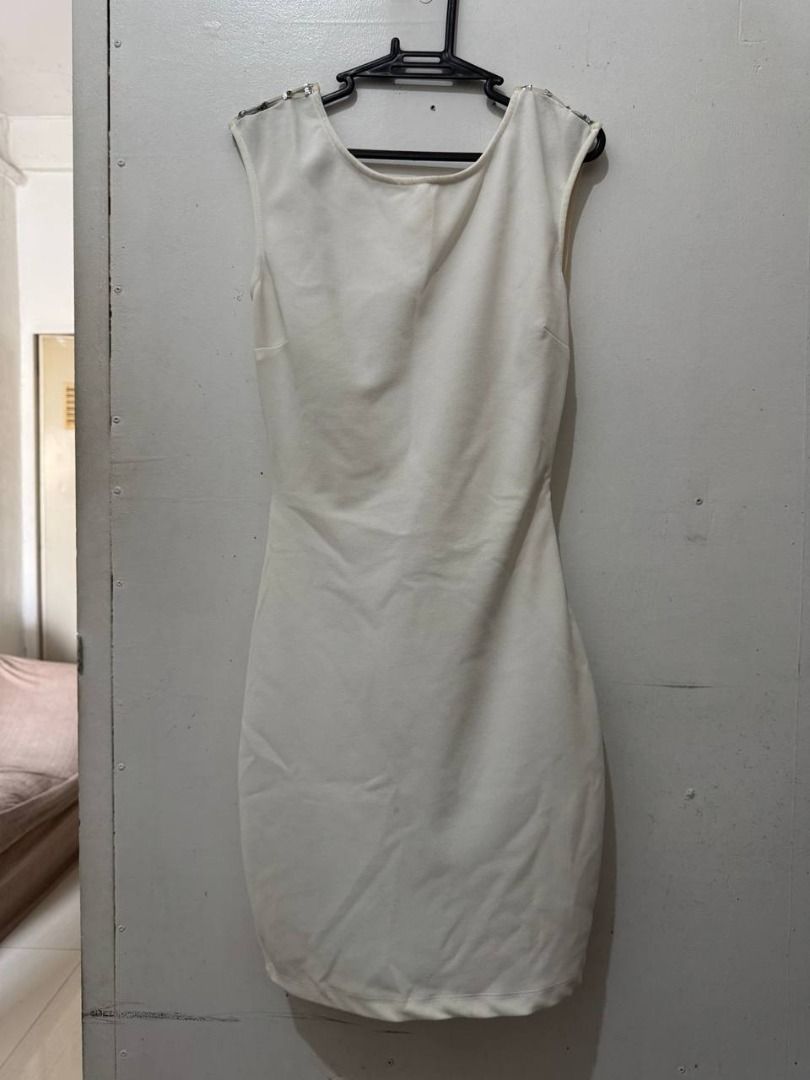 Stylish White Sequin Bodycon Dress (Category: Dresses) located in Santa Rosa. Submitted by sherikasstuff (Listing ID 1469957118, Image 3). Description: - Brand: Symphony - Size: S - Color: White/Off-white - Design: Sleeveless bodycon with sheer mesh panels and back silver sequin stripes - Back: Scoop neckline - Occasion: Ideal for cocktail parties and night outs.