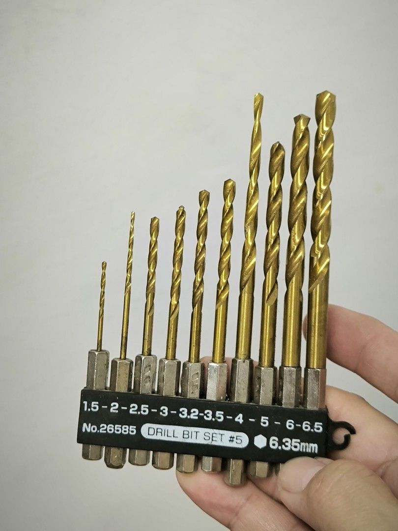 SUN UP (Konyo Japan) Titanium-Coated Hex Shank Drill Bit Set (Category: Home Improvement Tools & Accessories) located in Angeles City. Submitted by yellowbrickstore (Listing ID 1470117894, Image 1). Description: Brand / Manufacturer: SUN UP / Konyo Co., Ltd. (Japan) Model: No. 26585 (DRILL BIT SET #5) Shank Standard: 1/4" / 6.35 mm quick-change hex shank (compatible with impact drivers, cordless drills, and electric screwdrivers) Material & Finis