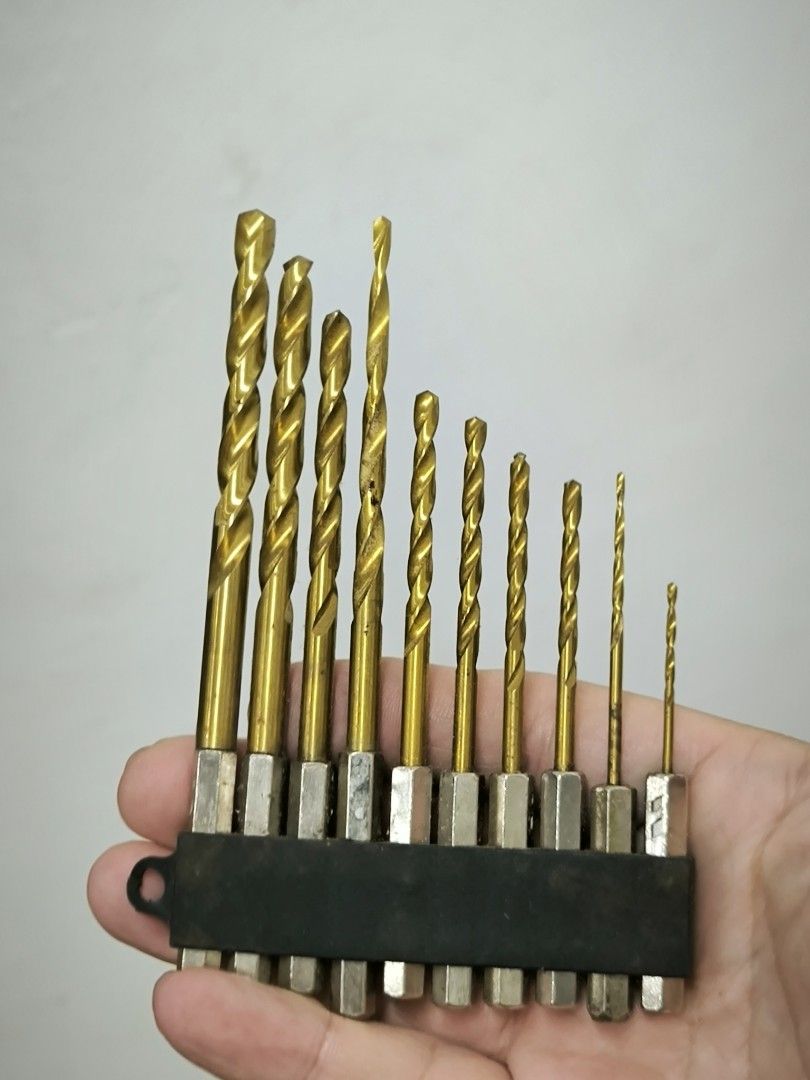 SUN UP (Konyo Japan) Titanium-Coated Hex Shank Drill Bit Set (Category: Home Improvement Tools & Accessories) located in Angeles City. Submitted by yellowbrickstore (Listing ID 1470117894, Image 2). Description: Brand / Manufacturer: SUN UP / Konyo Co., Ltd. (Japan) Model: No. 26585 (DRILL BIT SET #5) Shank Standard: 1/4" / 6.35 mm quick-change hex shank (compatible with impact drivers, cordless drills, and electric screwdrivers) Material & Finis