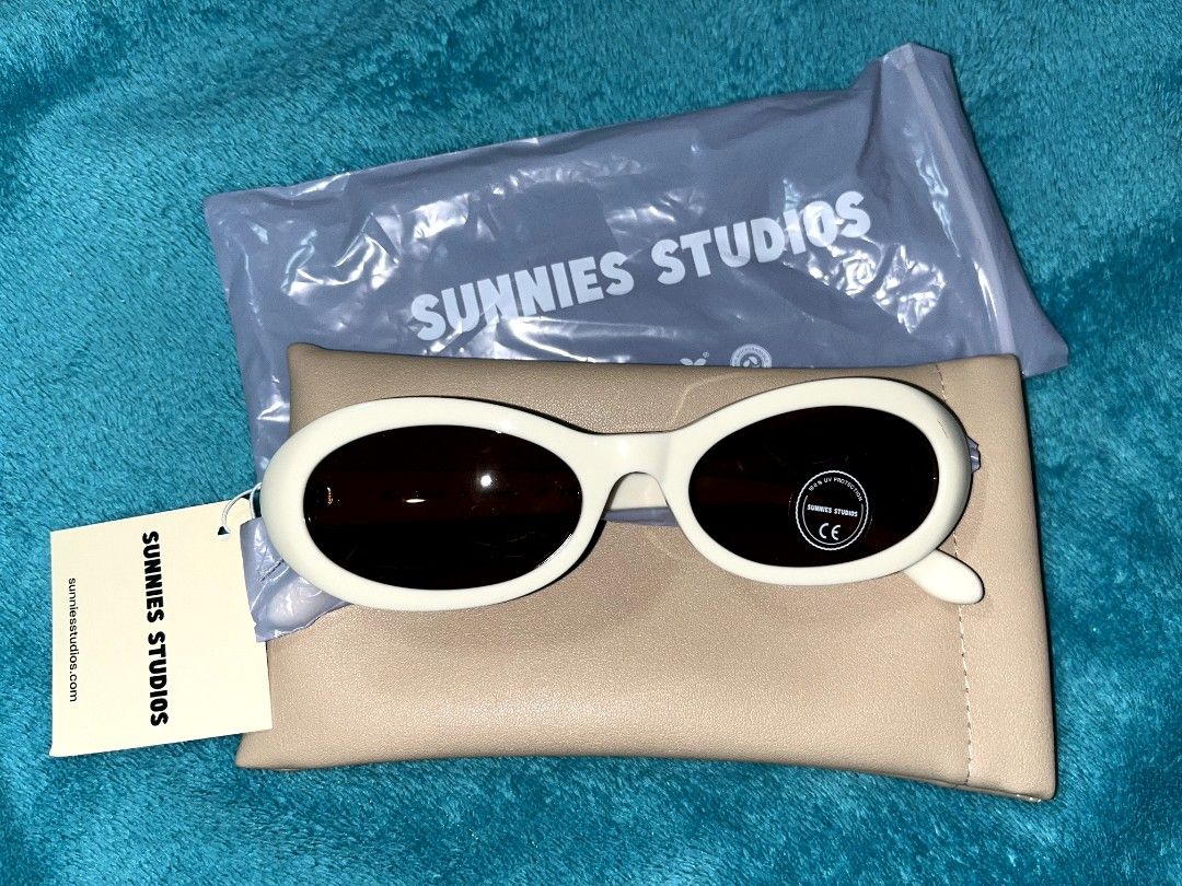 Sunnies Studios Sunglasses (Category: Sunglasses & Eyewear) located in Makati City. Submitted by maaarrrjjjj (Listing ID 1470054607, Image 2). Description: - Condition: Brand new with tags and original lens sticker - Includes beige leatherette protective case and lense cloth.