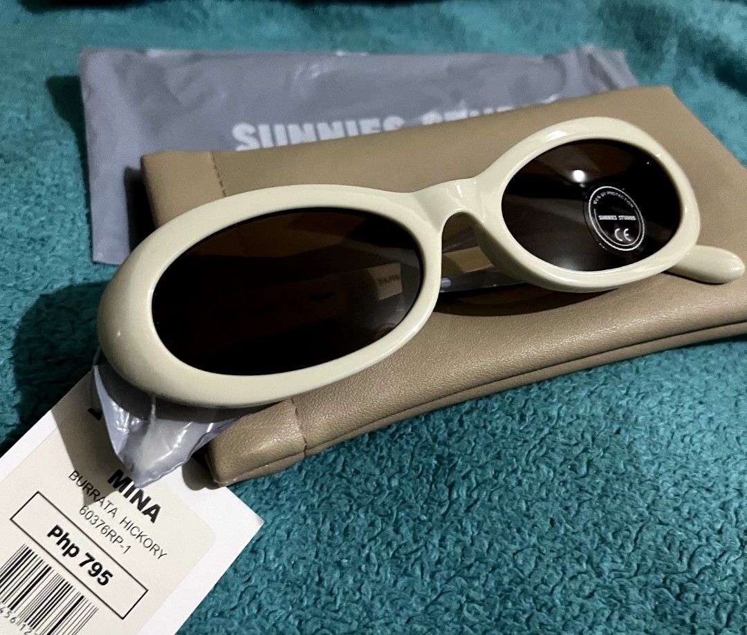 Sunnies Studios Sunglasses (Category: Sunglasses & Eyewear) located in Makati City. Submitted by maaarrrjjjj (Listing ID 1470054607, Image 3). Description: - Condition: Brand new with tags and original lens sticker - Includes beige leatherette protective case and lense cloth.