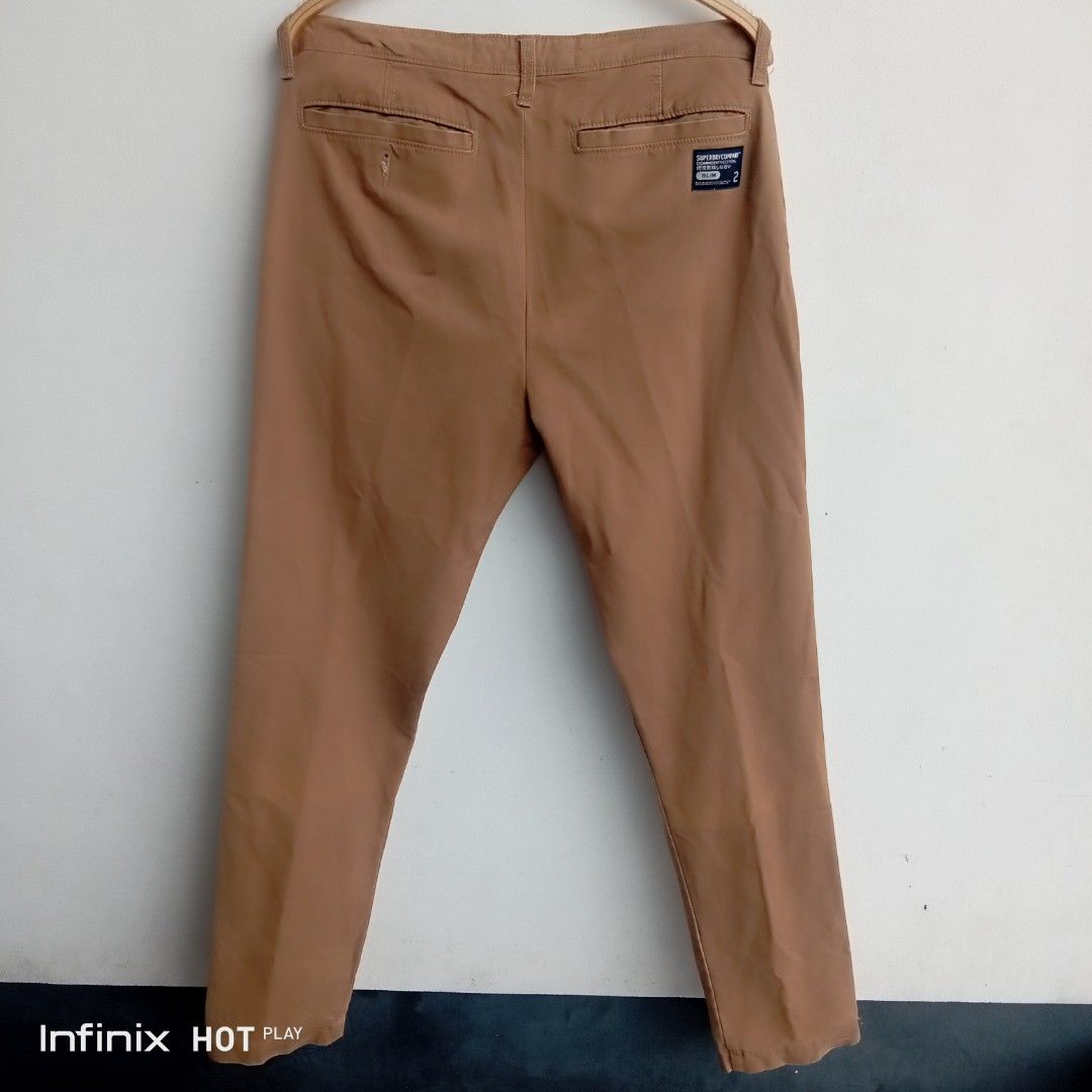 Superdry Company Slim Chinos Brown Size M (Category: Chinos) located in Manila. Submitted by rhegsthrifted (Listing ID 1470047005, Image 2). Description: ⚡💵PRICE : 400.00 [👉 Free Shipping Via JnT 👌] - Brand: Superdry Company - Style: Slim chinos / utility style - Color: Brown with vibrant orange inner waistband tape and piping - Size: Medium (M) -Dimes: •Waist - 32 - 34 • Length - 43 • Inseam - 33 • Hips - 39 - Material: 100% cotton - Origin: 