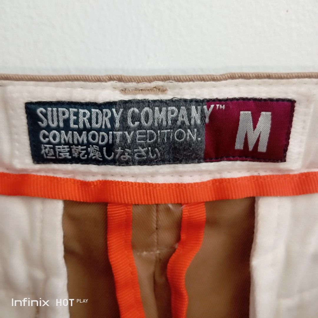 Superdry Company Slim Chinos Brown Size M (Category: Chinos) located in Manila. Submitted by rhegsthrifted (Listing ID 1470047005, Image 3). Description: ⚡💵PRICE : 400.00 [👉 Free Shipping Via JnT 👌] - Brand: Superdry Company - Style: Slim chinos / utility style - Color: Brown with vibrant orange inner waistband tape and piping - Size: Medium (M) -Dimes: •Waist - 32 - 34 • Length - 43 • Inseam - 33 • Hips - 39 - Material: 100% cotton - Origin: 