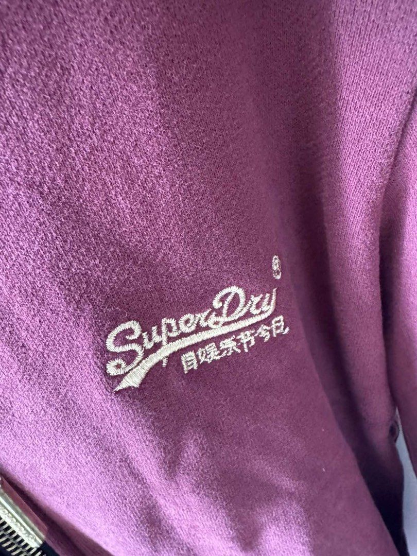 Superdry Hoodie Maroon (Category: Coats, Jackets and Outerwear) located in Antipolo. Submitted by ervinknows (Listing ID 1469953735, Image 3). Description: - Brand: Superdry (Orange Label) - Color: Rich Maroon - Material: Comfortable cotton blend - Design: Embroidered logo on chest, branded inner neckline tape - Features: Full zip front, adjustable drawstring hood, front pouch pockets - Finish: Ribbed cuffs and hem for a snug fit - Origin: Made i