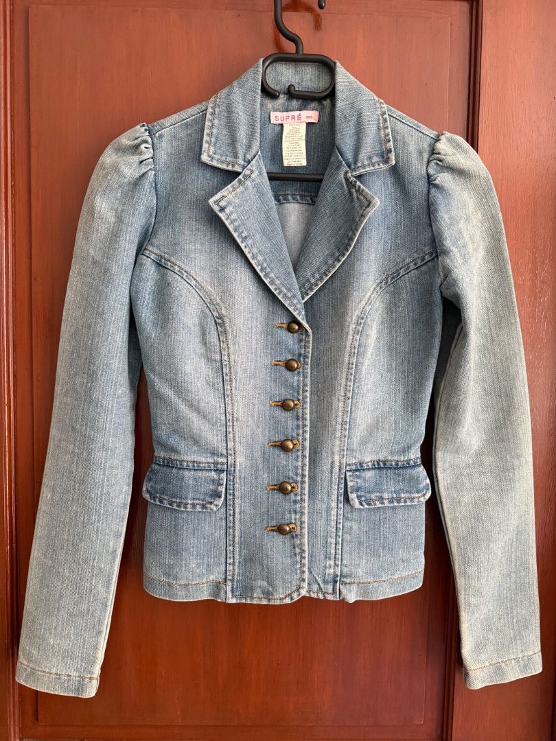 Supré Denim Jacket Blazer Vintage Style (Category: Coats, Jackets and Outerwear) located in Pasig City. Submitted by im_oreo (Listing ID 1469962429, Image 1). Description: - Bought in Melbourne Australia - Can fit XXS to XS - Pick up or courier at the buyer’s expense - Brand: Supré - Style: Light wash denim blazer with structured fit and retro vibe - Details: Lapel collar, long sleeves, front button closure with vintage-style brass buttons, and t