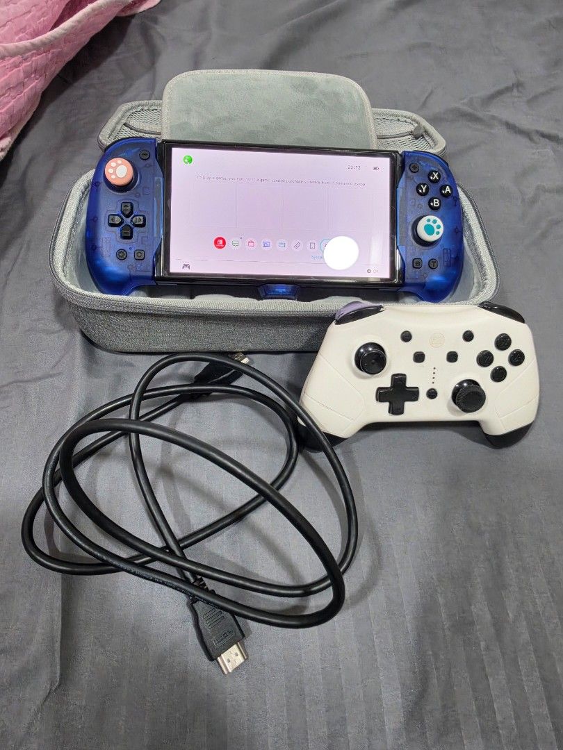 switch oled not fullset (Category: Nintendo) located in Kuala Lumpur. Submitted by boldforest66 (Listing ID 1469979849, Image 1). Description: switch oled tablet +joypad dobe(built in hdmi no need dock)+charger+controller rm 750 only cod kl.
