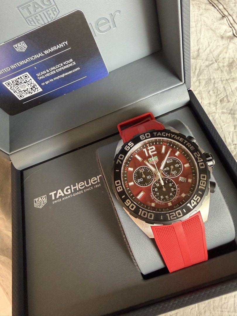 TAG Heuer Formula 1 Red Chronograph Watch (Category: Luxury Watches) located in Pasig City. Submitted by jayceess (Listing ID 1470095651, Image 1). Description: - Brand: TAG Heuer Formula 1 Chronograph - Dial: Striking red sunray dial with black tachymeter bezel - Strap: Vibrant red rubber strap - Movement: Reliable quartz movement in a stainless steel case - Condition: 9.2/10 - under warrant til 2027 - Inclusions: Complete set with original box,