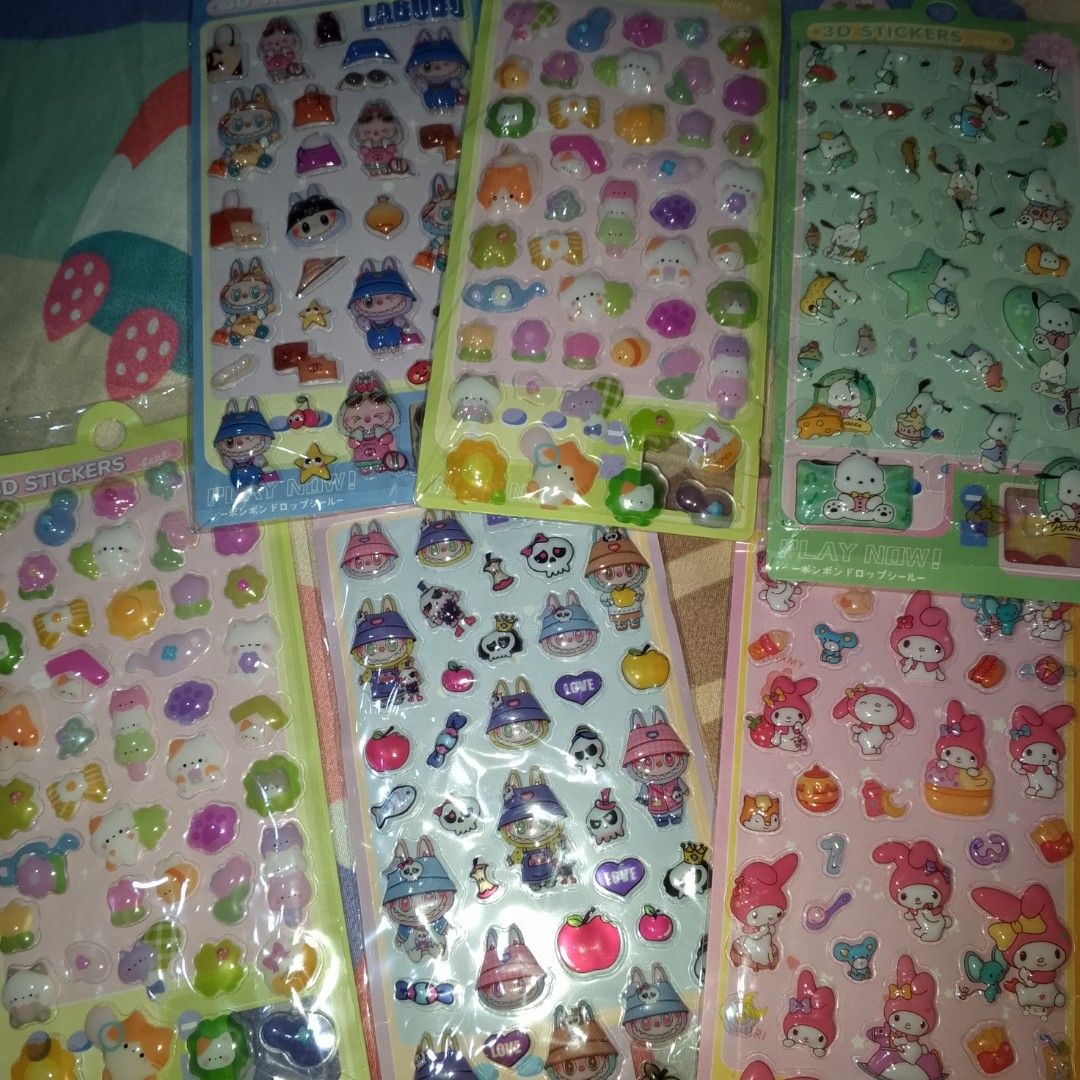 Take all Assorted Cute 3D Puffy Cartoon Stickers Sheets (Category: Art & Prints) located in Makati City. Submitted by meghantherobot (Listing ID 1470111571, Image 3). Description: - Brand new 3D puffy sticker sheets in original sealed packaging - Features popular characters like My Melody, Kuromi, Cinnamoroll, and Labubu - Includes cute animal and delicious food themes - Perfect for journaling, scrapbooking, and decorating phone cases - Multiple 