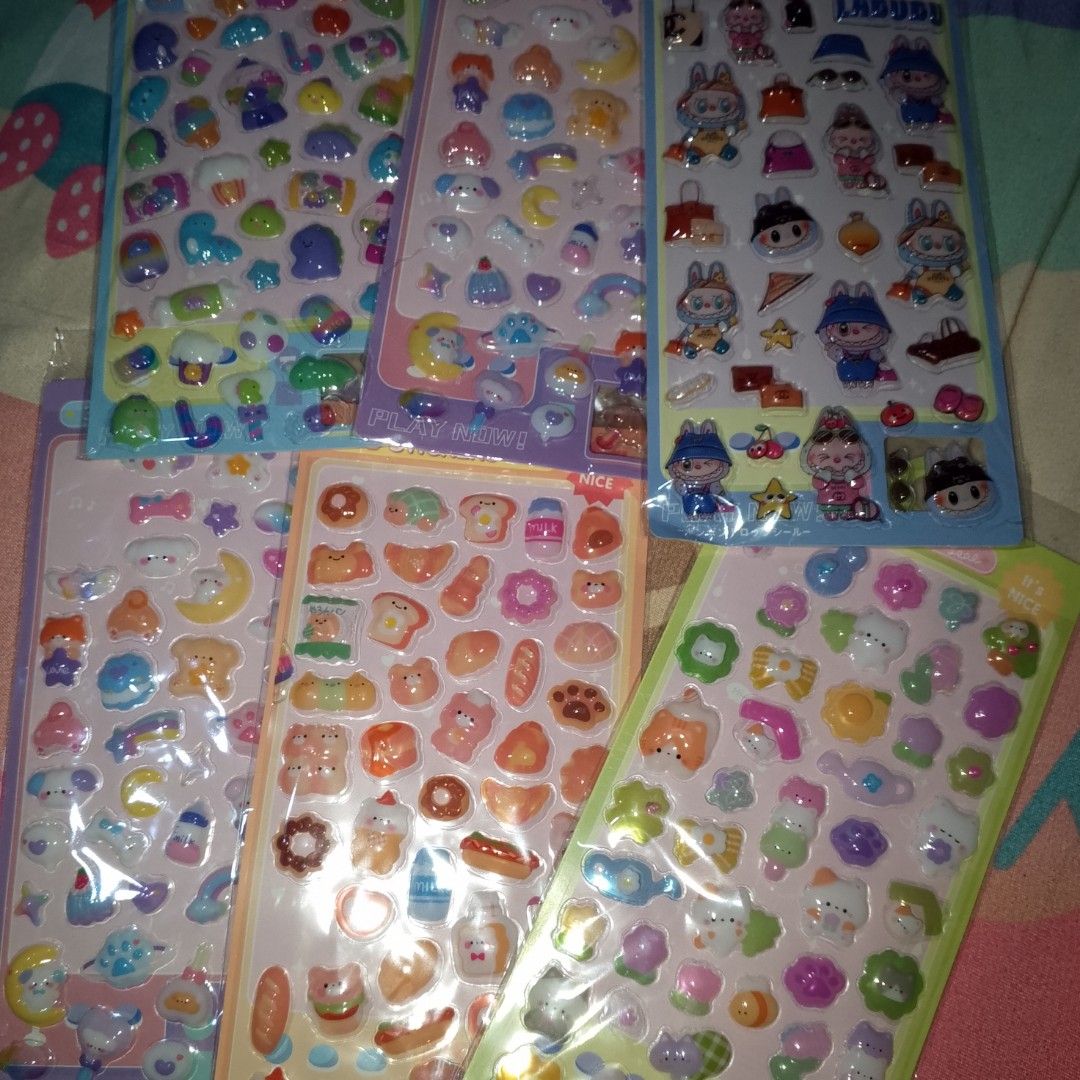 Take all Assorted Cute 3D Puffy Cartoon Stickers Sheets (Category: Art & Prints) located in Makati City. Submitted by meghantherobot (Listing ID 1470111571, Image 2). Description: - Brand new 3D puffy sticker sheets in original sealed packaging - Features popular characters like My Melody, Kuromi, Cinnamoroll, and Labubu - Includes cute animal and delicious food themes - Perfect for journaling, scrapbooking, and decorating phone cases - Multiple 