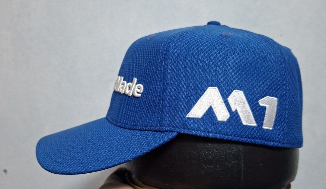 TaylorMade M1 TP5 New Era Blue Golf Hat Cap (Category: Caps & Hats) located in Taguig. Submitted by AlfonsoJaimepreloved (Listing ID 1469971828, Image 3). Description: Taylor Made TP5 M1 Golf Cap New Era 39Thirty Adult / Closed Cap Stretchable (M-L) Embroidered / 100% Polyester Royal Blue Colorway Excellent Used Condition Price : 680 Location : ibayo Tipas Taguig City MOD : Lalamove / LBC / J&T at buyer expense MOP : Gcash Thank you.