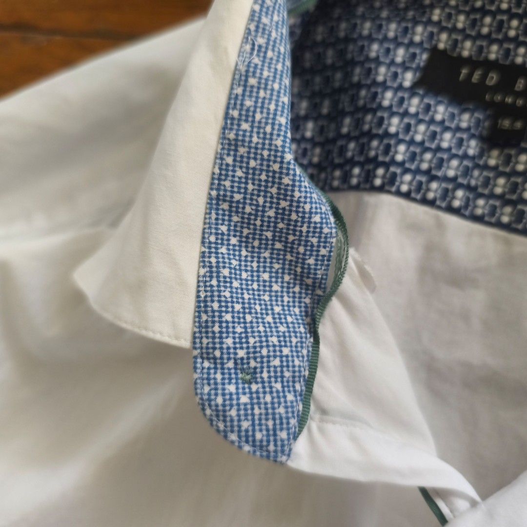 Ted Baker dress shirt (Category: Formal Shirts) located in Tayabas. Submitted by cat.b0i (Listing ID 1470033561, Image 3). Description: Size on tag: 15.5 Fitting: Men - M-L Women - L ‎Length: 27 ‎Width: 19.5 ‎Shoulder: 17 ‎Arm Space: 9 ‎Sleeve Length: 25.5 ‎ ‎Color: White with accents Color Rate: 9.2 ‎Material: 100% cotton properties: ‎Issues: minor distressing on accent inside collar (see pic 3) ‎Condition: great.
