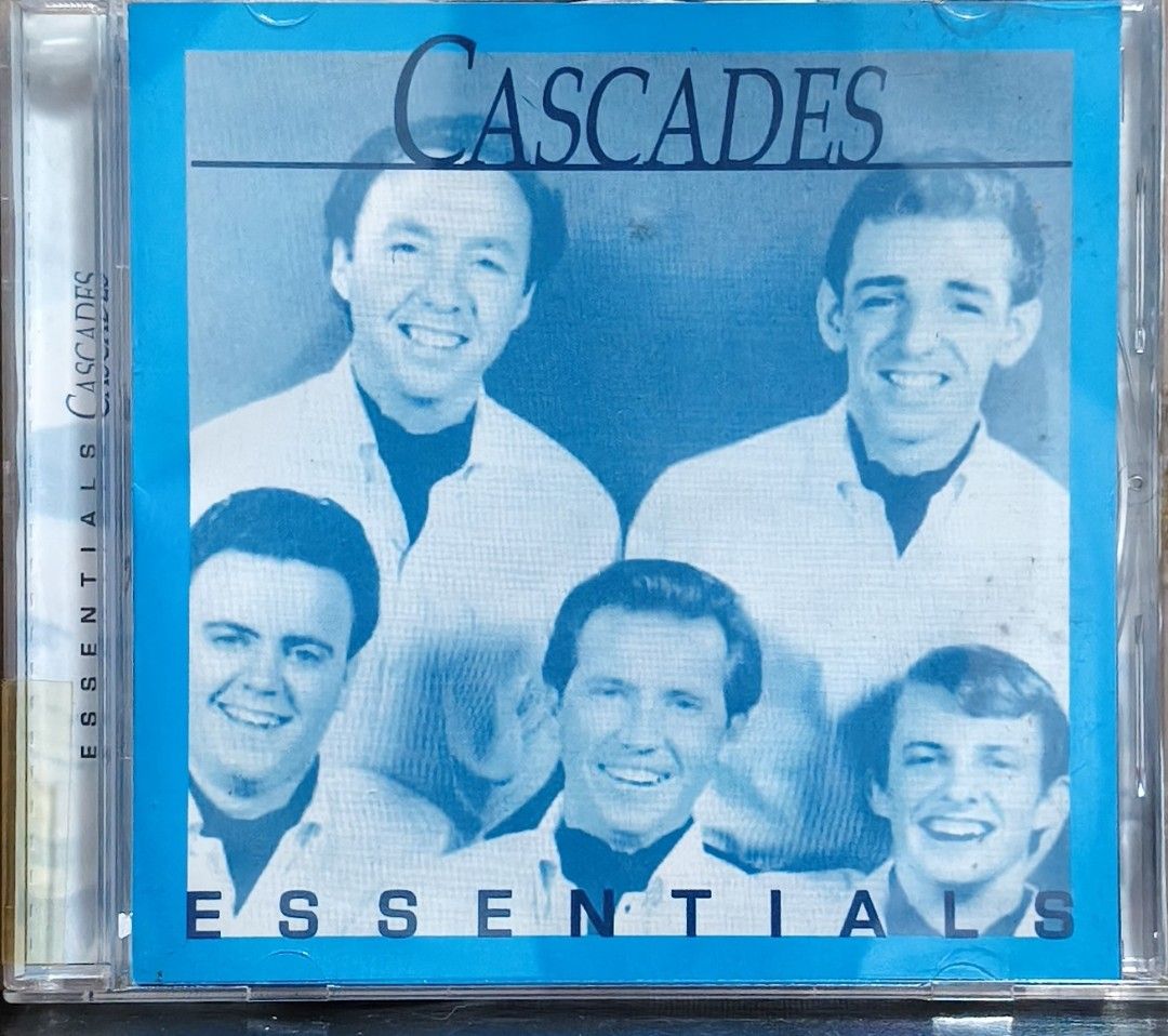 The Cascades Essentials CD Album (Category: CDs & DVDs) located in Manila. Submitted by ruelcabrer77078 (Listing ID 1470093159, Image 1). Description: - Artist & Album: The Cascades - Essentials - Release: Warner Music Philippines, 2005 - Tracks: 12 classic hits including Shy Girl, Rhythm of the Rain, Dreamin', and The Last Leaf - Format: Standard jewel case - Inclusions: Original disc and inserts with tracklist on the back cover - Condition: Goo