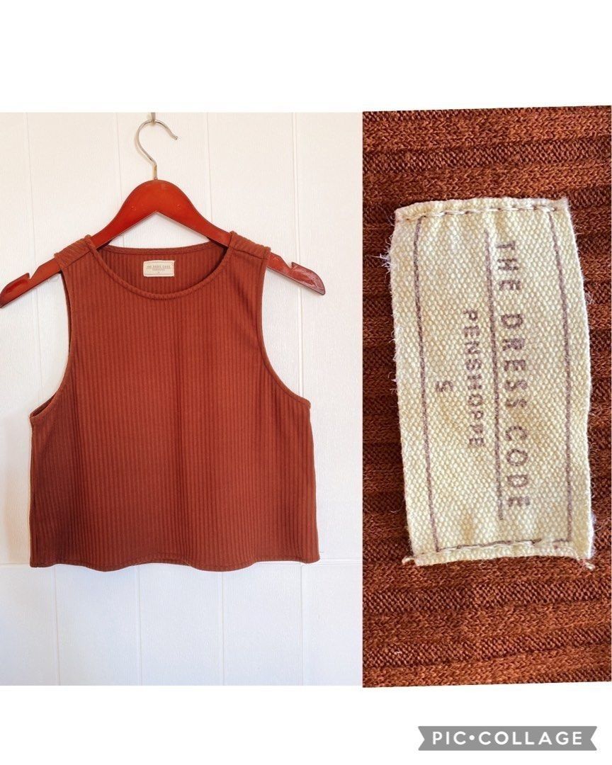 The Dress Code Penshoppe Ribbed Crop Top Size S (Category: Sleeveless) located in Calamba. Submitted by iam.hides (Listing ID 1470032193, Image 1). Description: - Brand: The Dress Code by Penshoppe - Size: Small - Color: Rust brown - Material: Soft, stretchy ribbed fabric - Design: Sleeveless with a round neckline - Fit: Crop top length, ideal for high-waisted denim or skirts - Condition: Clean interior tag intact, well-maintained.