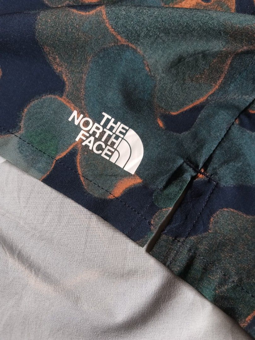 The North Face athletic Camo Shorts (Category: Shorts) located in Tanay. Submitted by jrgoods (Listing ID 1469959494, Image 3). Description: TNF athletics aop short Large men's above the knee Waistline 34-36 Length 17.5 Good as new condition 880+ship Tanay Rizal location Shipping Nationwide - Color/Pattern: Blue and green abstract camouflage - Features: Elastic drawstring waistband, side pockets, lightweight fabric - Branding: White TNF logo on l