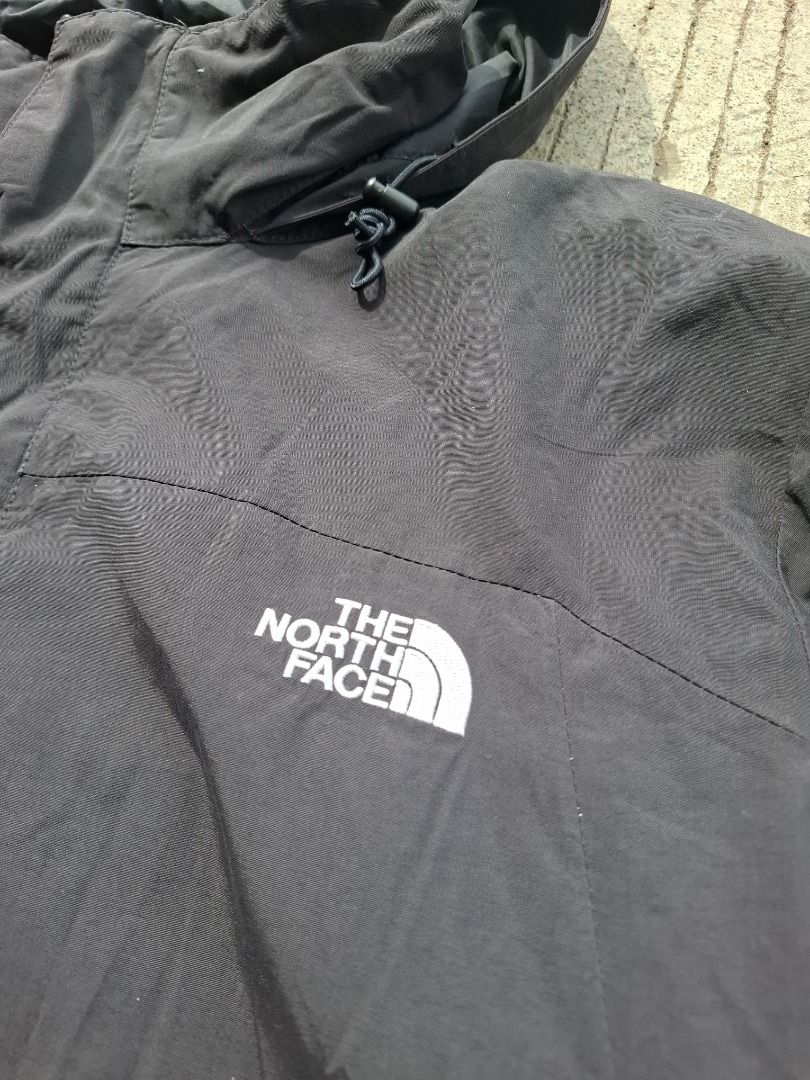 The North Face Black Waterproof Hooded Jacket (Category: Coats, Jackets and Outerwear) located in Caloocan City. Submitted by bobmarlou1923 (Listing ID 1469996321, Image 3). Description: - Authentic The North Face black jacket - Men's size Large - Weather-resistant nylon shell with a lightweight lining - Equipped with an adjustable hood and secure interior tags - Ideal lightweight layer for outdoor adventures.