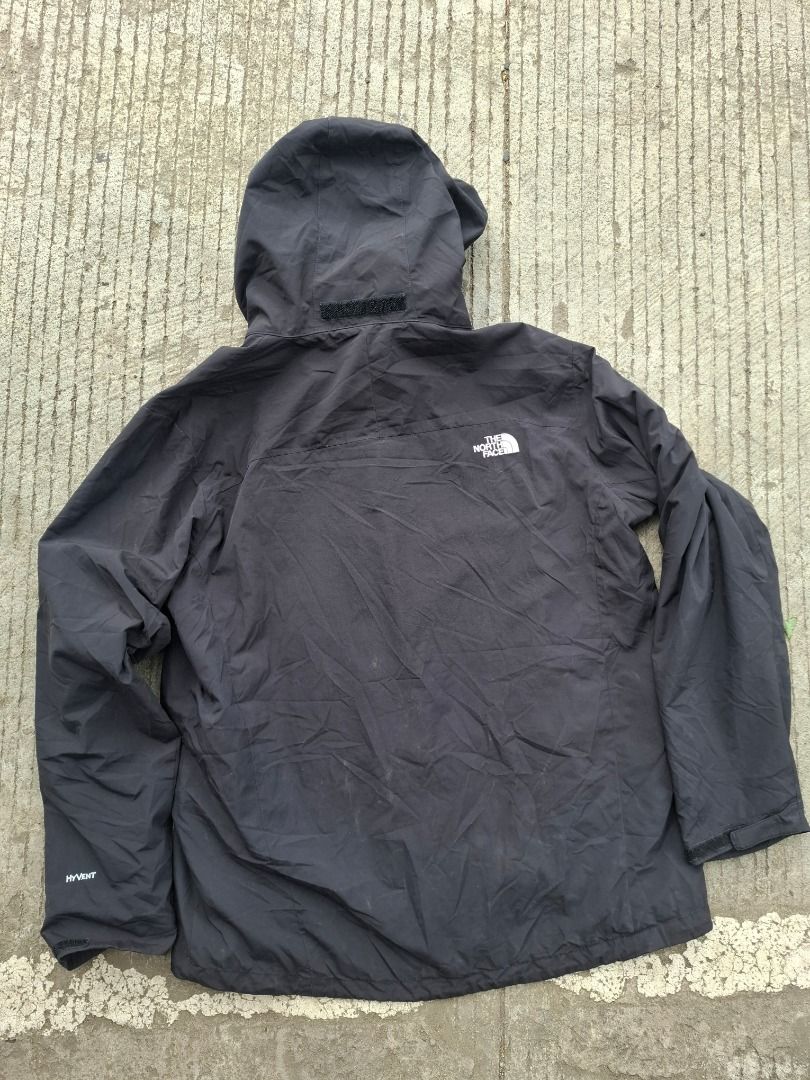 The North Face Black Waterproof Hooded Jacket (Category: Coats, Jackets and Outerwear) located in Caloocan City. Submitted by bobmarlou1923 (Listing ID 1469996321, Image 2). Description: - Authentic The North Face black jacket - Men's size Large - Weather-resistant nylon shell with a lightweight lining - Equipped with an adjustable hood and secure interior tags - Ideal lightweight layer for outdoor adventures.