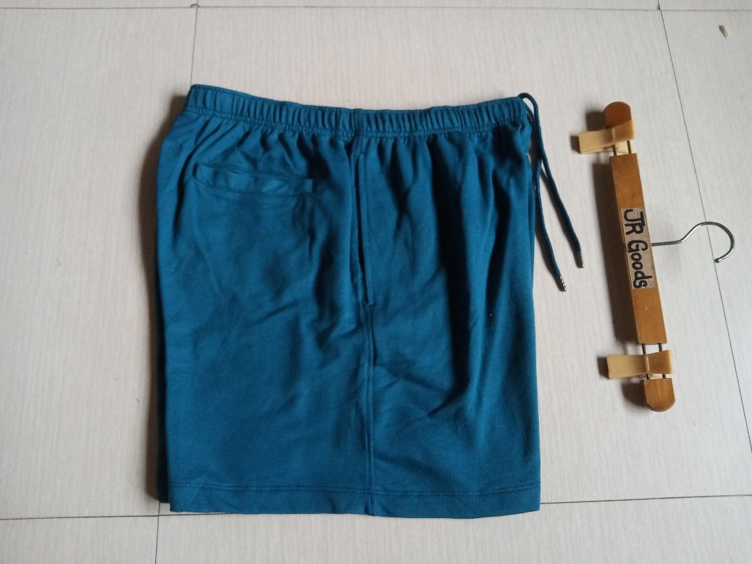 The North Face Teal Drawstring Shorts (Category: Shorts) located in Tanay. Submitted by jrgoods (Listing ID 1469998562, Image 3). Description: TNF sweatshort Medium to large men's Above the knee Waistline 32-36 Length 17.5 Good as new condition 599+ship Tanay Rizal location Shipping Nationwide - Color: Teal with white embroidered logo - Material: Soft and comfortable knit fabric - Features: Elastic waistband with matching blue drawstring and meta