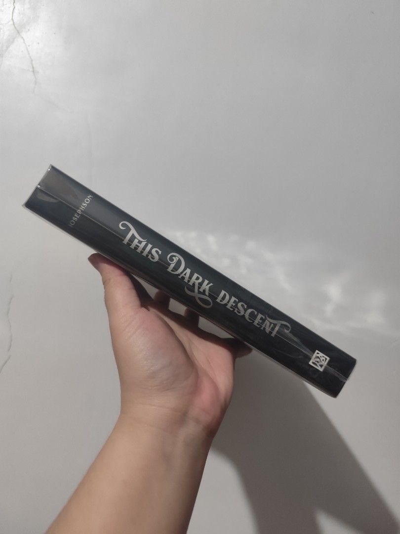 This Dark Descent by Kalyn Josephson Owlcrate Special Edition (Category: Storybooks) located in Bulacan. Submitted by mikkaryne (Listing ID 1470051349, Image 3). Description: - Title: This Dark Descent by Kalyn Josephson (Owlcrate Special Edition) - Format: Hardcover - Condition: Brand new - Special Features: Black sprayed edges and custom stenciled page edges featuring house crests - Perfect addition to any fantasy book collection!.