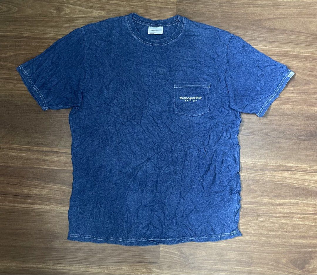 thisisneverthat Pocket T-Shirt Blue (Category: Tshirts & Polo Shirts ) located in Bacolod City. Submitted by jmcercado (Listing ID 1469992095, Image 1). Description: - Brand: thisisneverthat - Style: Blue denim wash pocket t-shirt with crew neck and short sleeves - Details: Contrast white stitching and embroidered logo on the chest pocket - Condition: Excellent.