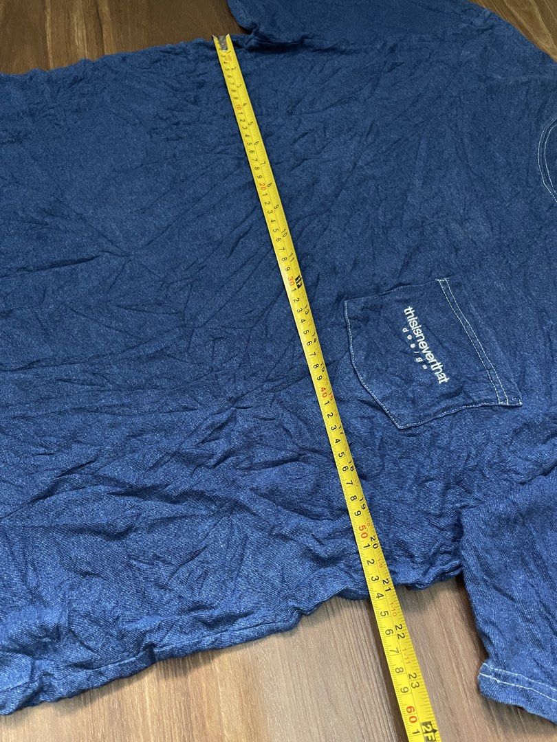 thisisneverthat Pocket T-Shirt Blue (Category: Tshirts & Polo Shirts ) located in Bacolod City. Submitted by jmcercado (Listing ID 1469992095, Image 3). Description: - Brand: thisisneverthat - Style: Blue denim wash pocket t-shirt with crew neck and short sleeves - Details: Contrast white stitching and embroidered logo on the chest pocket - Condition: Excellent.