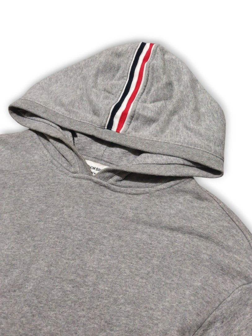 Thom Browne Classic Hoodie Stripe Back (Category: Luxury Apparel) located in Manila. Submitted by fgkamiseta_2nd (Listing ID 1470037201, Image 3). Description: Thom Browne Classic Hoodie Stripe Back Size 1 Dimensions Width - 20.5 Length - 26 Excellent Condition Authentic Guaranteed ₱ 8,000+Ship.