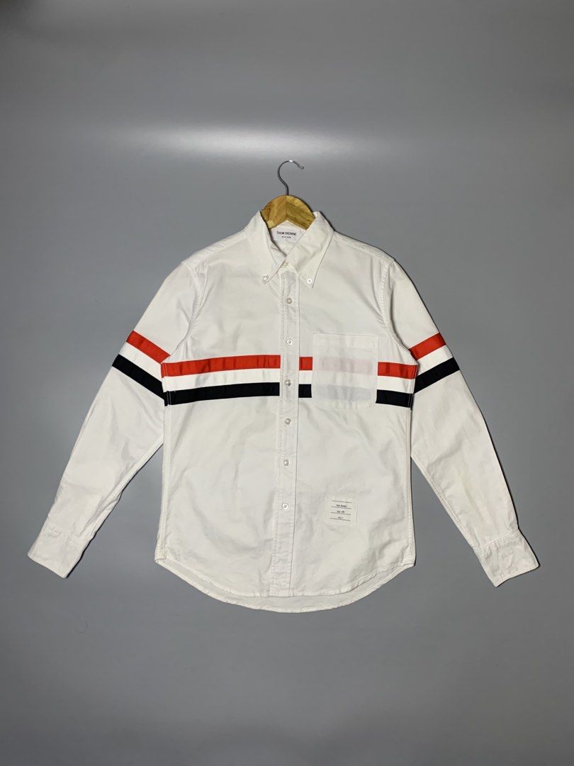 Thom Browne. Oxford Button Down Polo Long sleeve White (Category: Luxury Apparel) located in Manila. Submitted by macadr1p (Listing ID 1470101480, Image 2). Description: Thom Browne. 𝑴𝒆𝒂𝒔𝒖𝒓𝒆𝒎𝒆𝒏𝒕𝒔 — 19.5x26 𝑩𝒆𝒔𝒕 𝑭𝒊𝒕 — Medium 𝑪𝒐𝒍𝒐𝒓 𝑹𝒂𝒕𝒆— 10/10 𝑪𝒐𝒏𝒅𝒊𝒕𝒊𝒐𝒏 — Like New 𝑻𝒂𝒈𝒔 — Complete 𝑰𝒔𝒔𝒖𝒆𝒔 — None 𝑭𝒂𝒃𝒓𝒊𝒄 — High-quality 𝑪𝒐𝒍𝒐𝒓 — Not faded 𝑺𝒊𝒈𝒏𝒔 𝒐𝒇 𝑼𝒔𝒂𝒈𝒆 — None 𝑫𝑰𝑺𝑪𝑳𝑨𝑰𝑴𝑬𝑹❗️ 𝑨