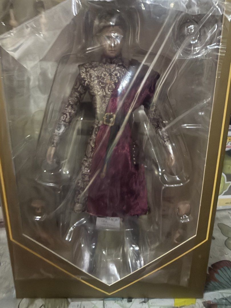 Threezero Game of Thrones King Joffrey Baratheon Deluxe Version (Category: Figurines & Statues) located in Manila. Submitted by funkospot (Listing ID 1469987778, Image 3). Description: - Brand new, unopened Threezero Game of Thrones King Joffrey Baratheon Deluxe Version - Stunning gold embossed box featuring the Lannister lion emblem and house words - Highly detailed patterned tunic and crimson sash - Includes sword, extra interchangeable hands, 