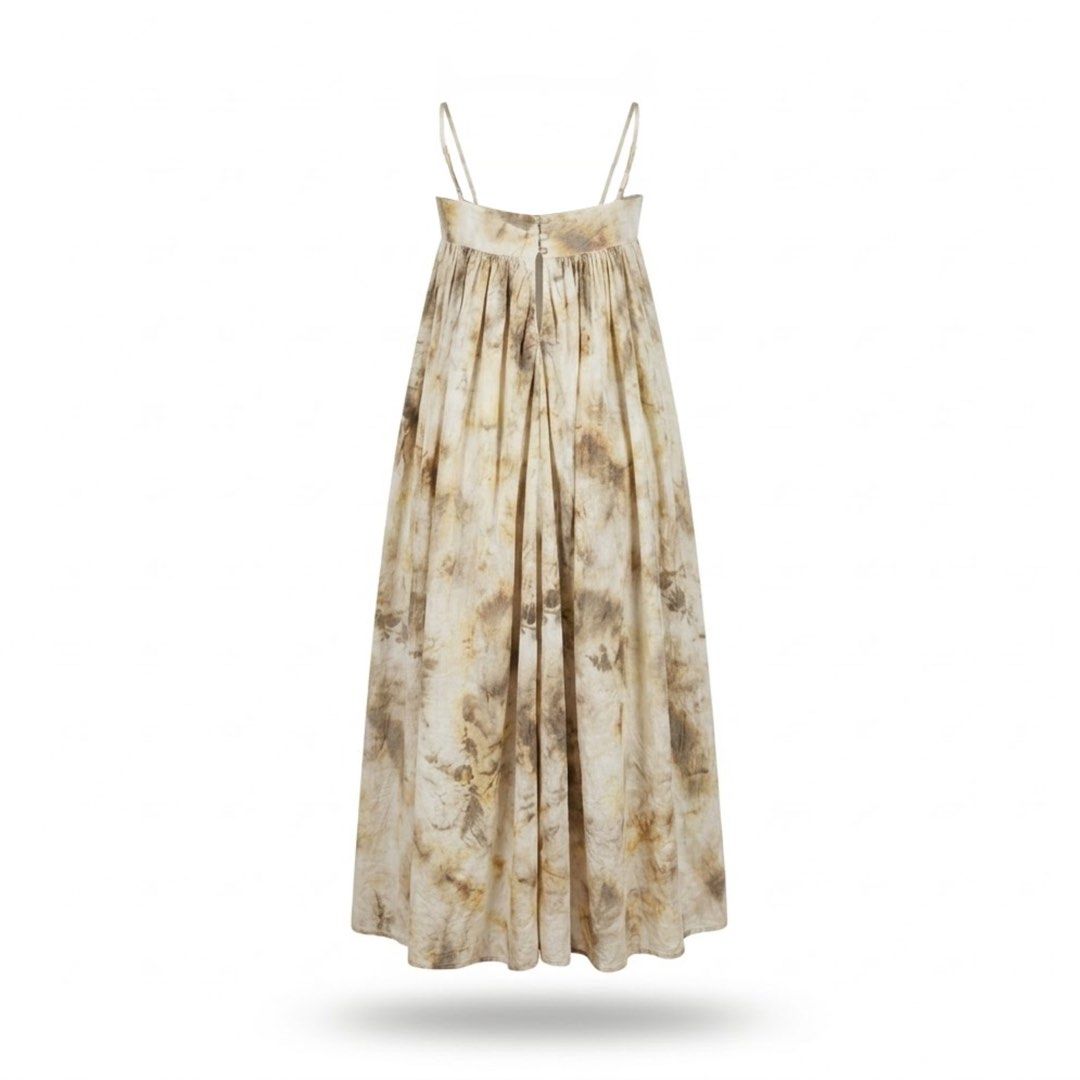 Tie-dye spaghetti strap volume maxi dress (Category: Dresses) located in General Trias. Submitted by dearsunnyshine (Listing ID 1470001284, Image 1). Description: - Earth-toned tie-dye design - Spaghetti straps with flattering gathered bust detail - Beautiful flowy silhouette - Midi to maxi length depending on height - Lightweight and travel-friendly material - Perfect for sunset beach walks or cafe dates.