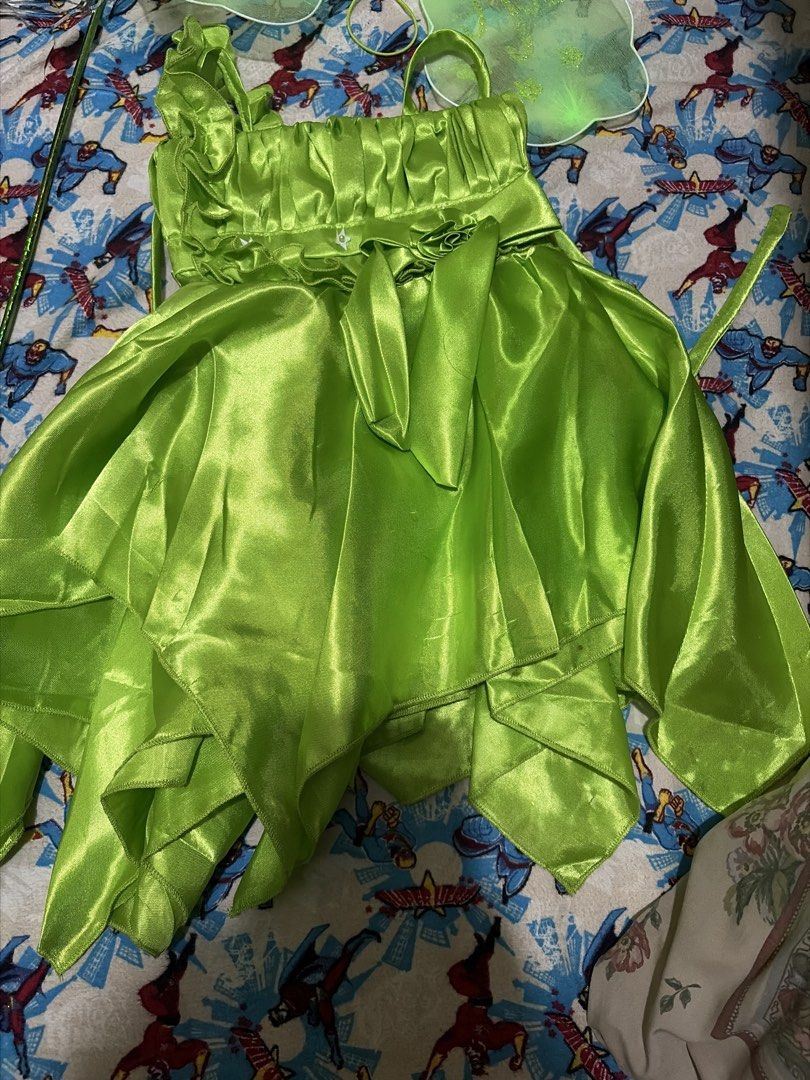 Tinker Bell Costume (Category: Babies & Kids Fashion) located in Pasig City. Submitted by abigaelde41187 (Listing ID 1470032385, Image 3). Description: Tinkerbell dress used once only during office trick or treat. Included is the headband, wing and wand. The dress is adjustable at the back. Can fit for 2-3 years old.